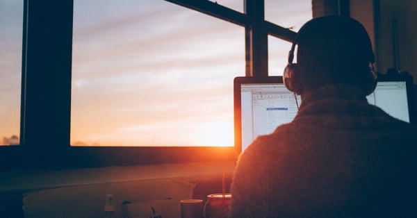 office worker sitting in front of laptop